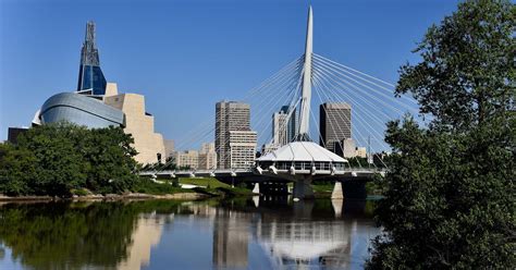 flights from manila to winnipeg